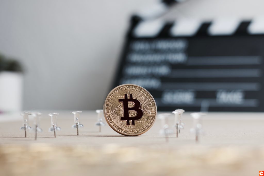 Bitcoin coin in the cinema